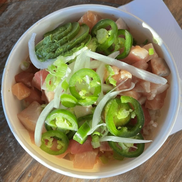 Poke Chop poke bowl with tuna, avocado, jalapeños, and onions.